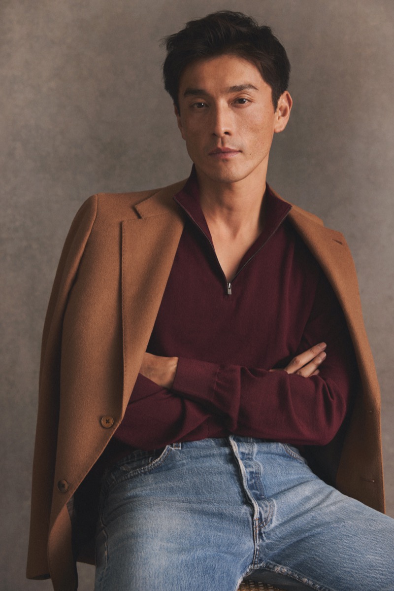 Model Daisuke Ueda wears Eton’s 14-gauge fine-knit Tollegno Merino wool quarter-zip in oxblood red.