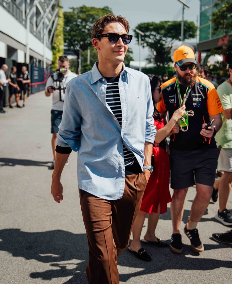 Formula 1 driver George Russell wears a smart Tommy Hilfiger look.