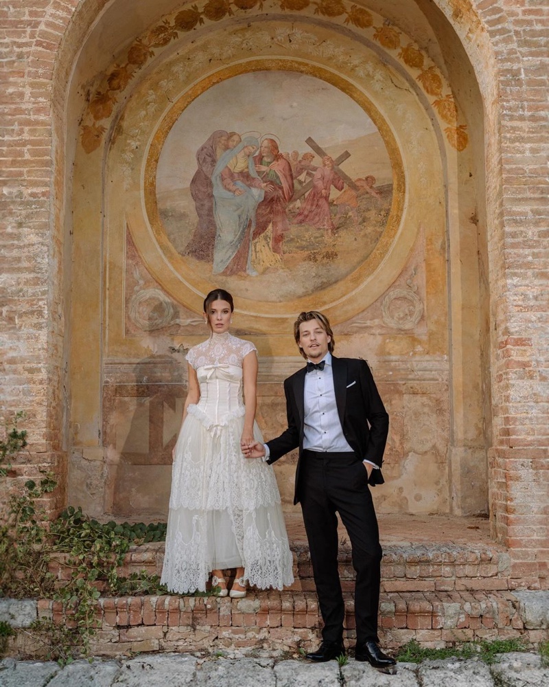 Millie Bobby Brown and Jake Bongiovi wear classic wedding styles for their big day. 