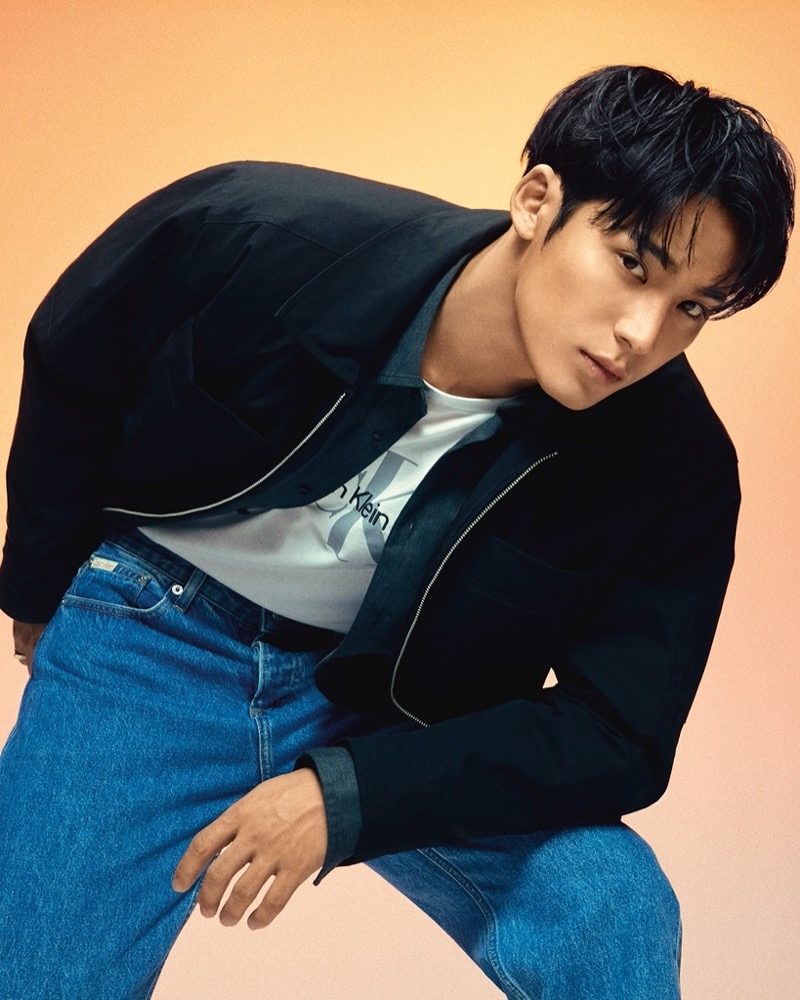 Reuniting with Calvin Klein, MINGYU is stylish in a shirt jacket and jeans.