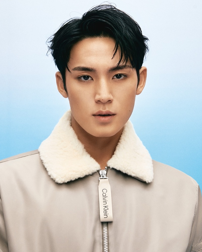 MINGYU sports a bomber with a sherpa collar from Calvin Klein’s fall 2024 lineup for men.