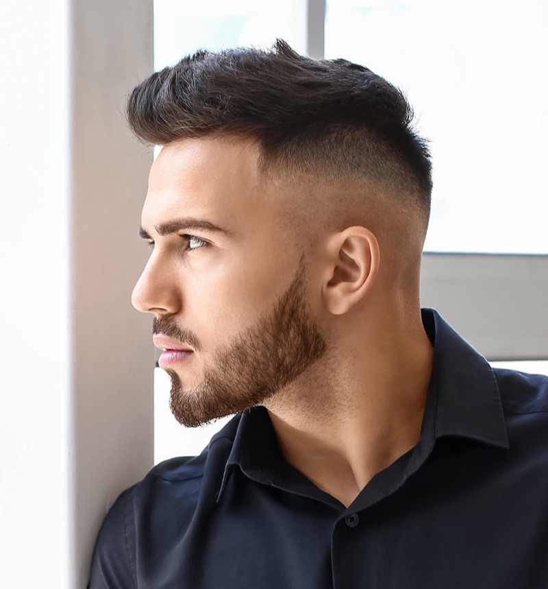 The razor fade elevates the quiff, bringing sharper definition and a crisp finish. 