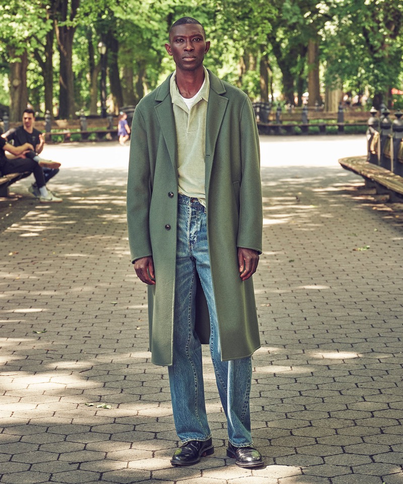 Model Armando Cabral sports Todd Snyder’s Italian wool topcoat in sea green with a sage velour polo and selvedge jeans.