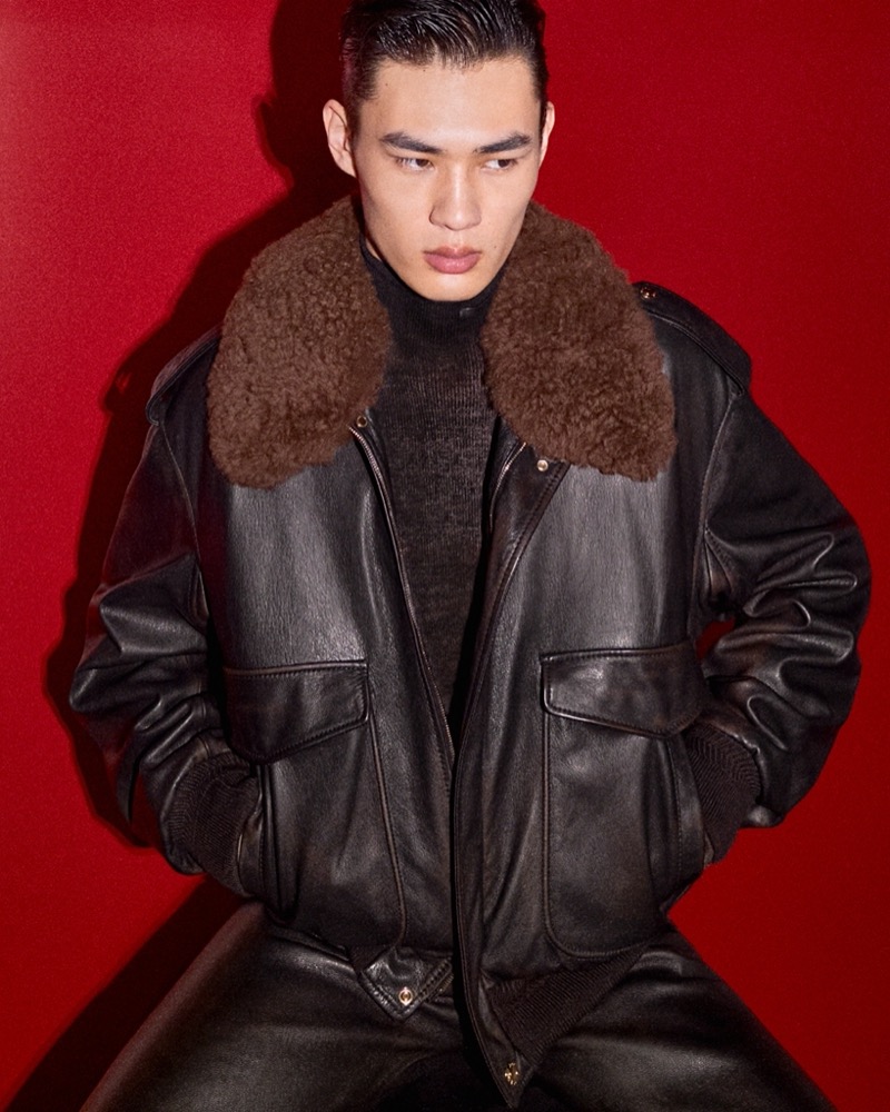 Zhaoyi Fan rocks a leather jacket and pants from Versace’s fall-winter 2024 collection.