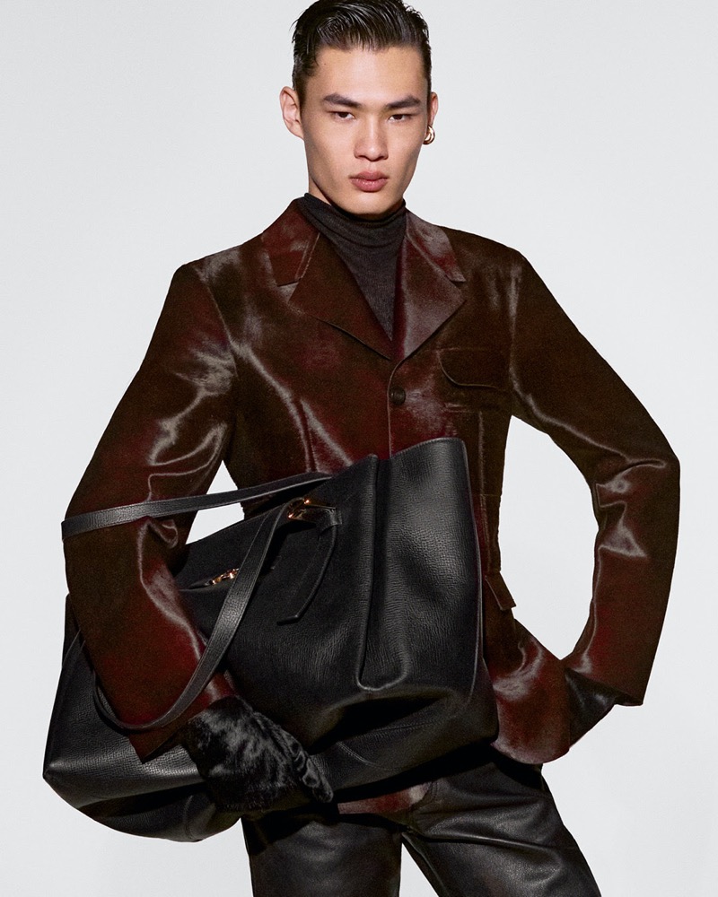 Model Zhaoyi Fan wears a ponyskin leather jacket for Versace’s fall 2024 campaign.