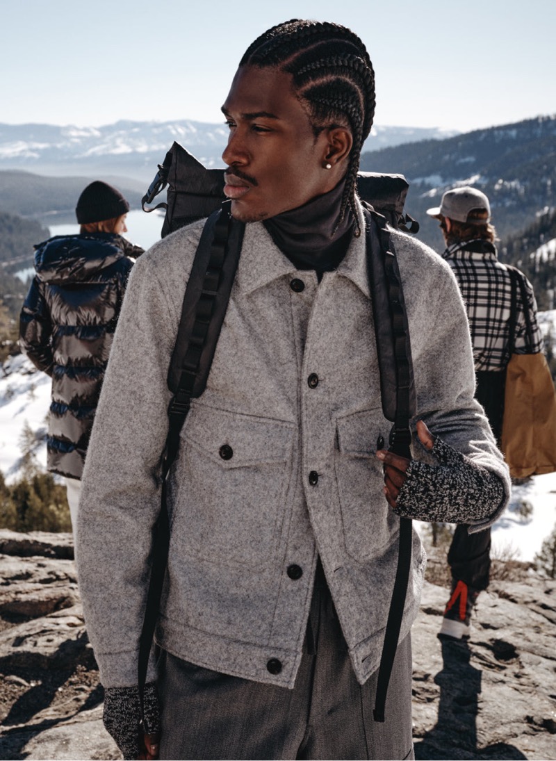 A chic vision, Anarcius Jean wears the Todd Snyder for Woolrich Black Label reflective shirt jacket.